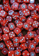 Pile of red fleur 16mm D6 dice for a sci-fi crusader army