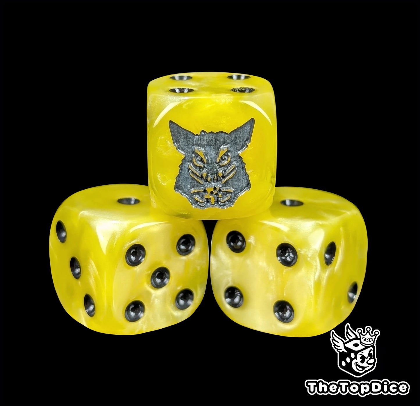 Close-up of a yellow D6 die with a grey rat holding cheese