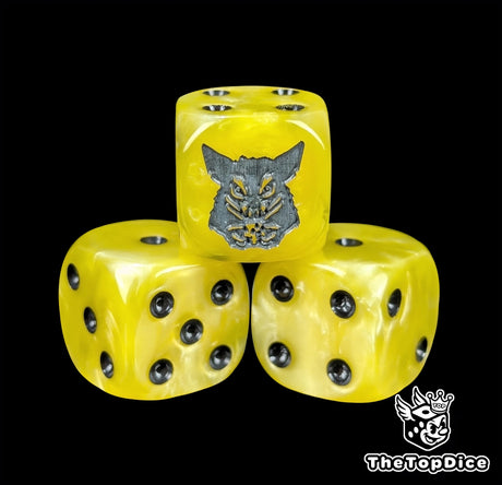 Close-up of a yellow D6 die with a grey rat holding cheese