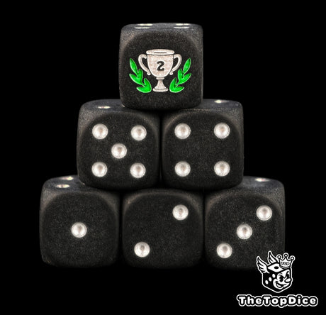 Second place trophy dice, matte black 16mm D6 with silver pips and a silver runner up cup in a green laurel, a game night prize and tournament award