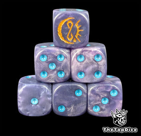 Purple resin D6 dice with a gold crescent moon emblem and blue pips