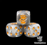 Three silver chapter dice with a gold gauntlet crushing a skull