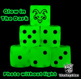The same green Skaven ratmen dice glowing in the dark, black rat face and pips visible