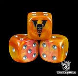 Close-up of an orange skull crest D6 die with silver pips