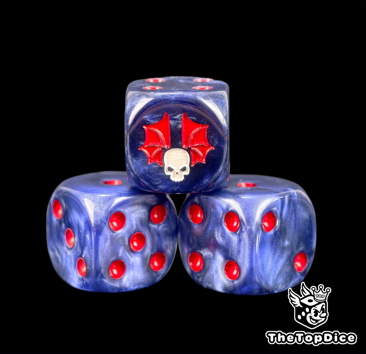 Three storm blue Night Lords dice with a skull on ragged red wings