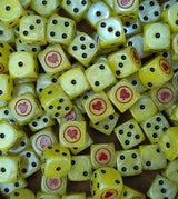 Full tray of yellow Sorrow Heart Legion D6 dice for tabletop wargaming and RPGs