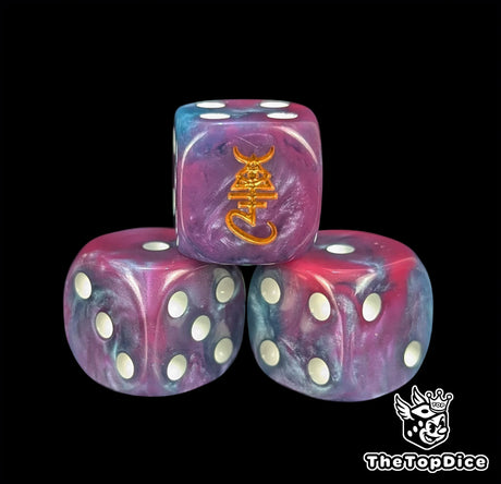 Close up of a purple and blue 16mm resin D6 die engraved with a gold soul rune and white pips