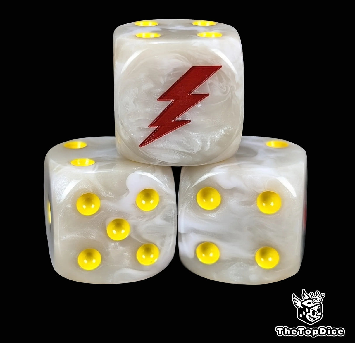 Close up of a white 16mm resin D6 die engraved with a red lightning bolt and yellow pips
