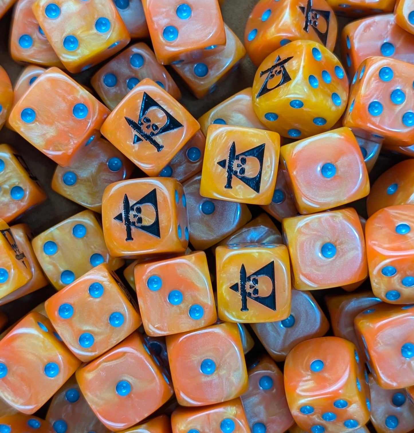 Pile of orange skull squad 16mm D6 dice for a sci-fi skirmish team