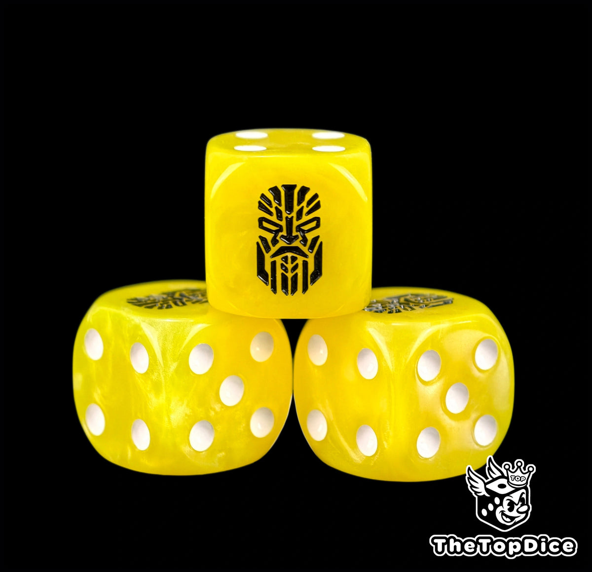 Three yellow space dwarf dice with a black ancestor rune on top
