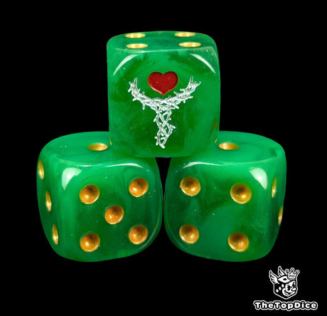 Close-up of three green 16mm grimdark D6 dice engraved with a white thorn chalice emblem
