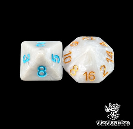 Close up of a bone white D8 and D16 with gold numbers for scatter and long range fantasy football rolls