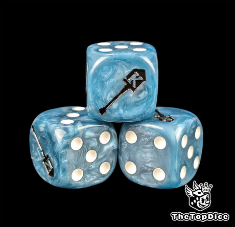 Close-up of a blue D6 die with a black trench spade emblem
