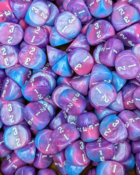 Pile of tricolor D3 three sided dice for tabletop games