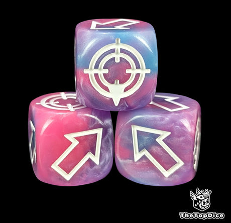 Close up of a blue lilac and pink resin scatter die showing the direction arrows