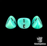 Detail of three turquoise 16mm three sided dice and their black engraving