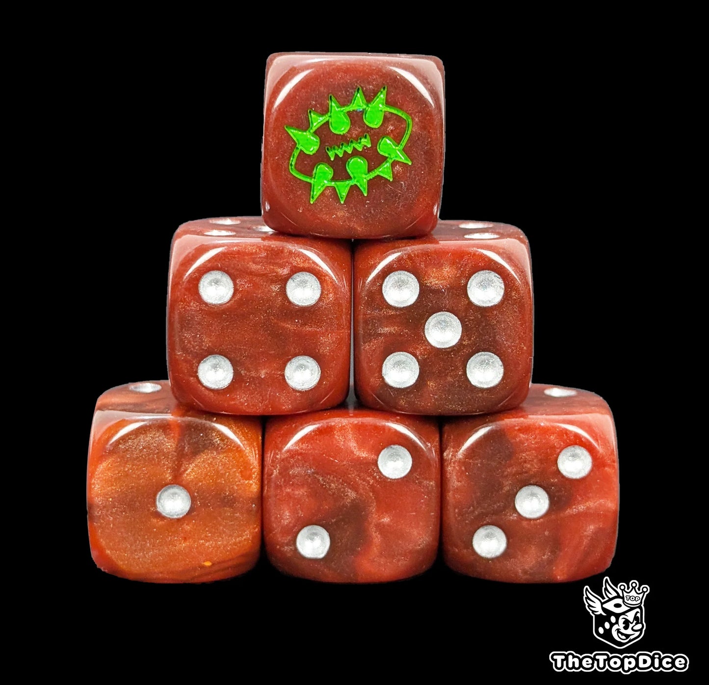 Close up of two red D6 with a green spiked ball logo on the six face for fantasy football