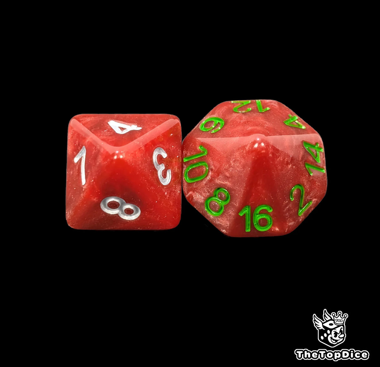 Close up of a red D8 and D16 with silver numbers for scatter and long range rolls