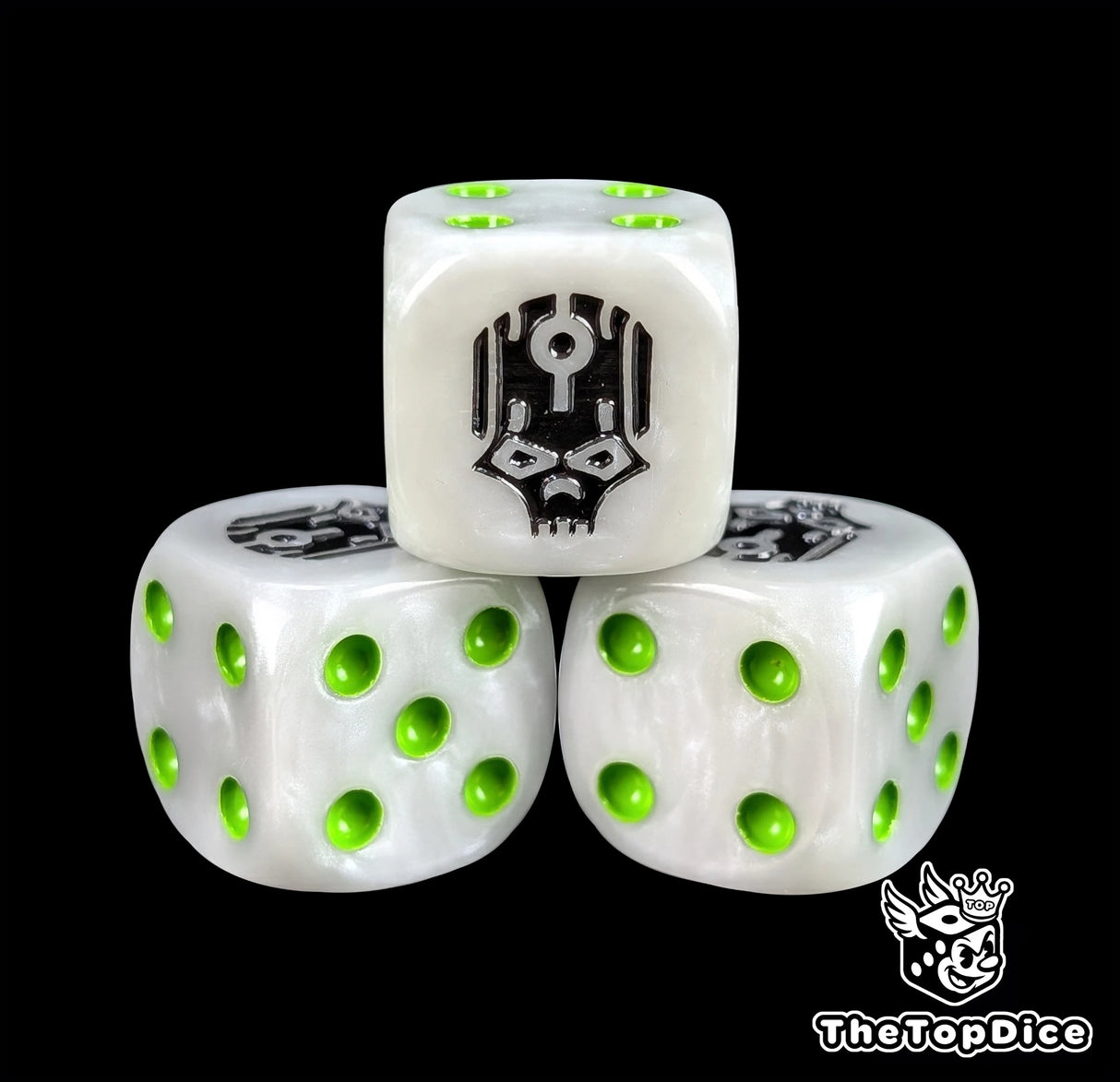 Close-up of a white D6 die with a black robot skull face and green pips