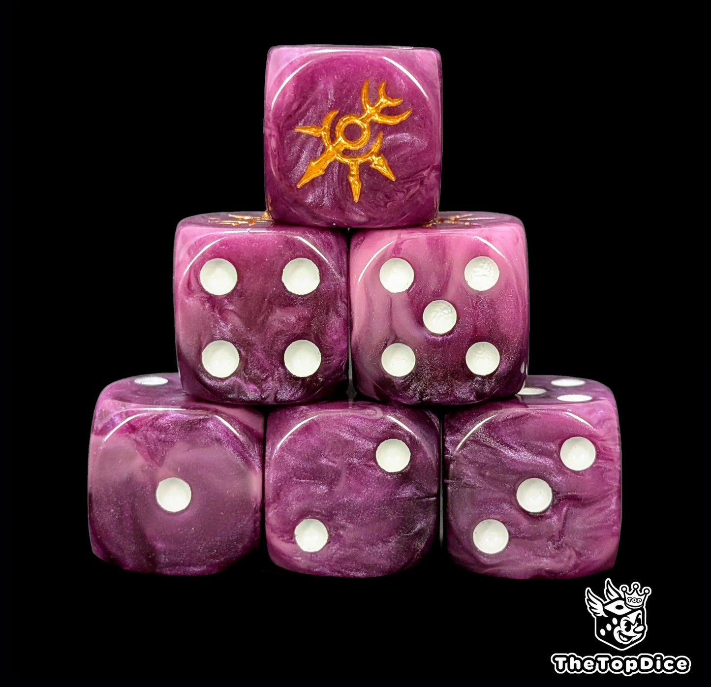 Close up of two purple D6 with a gold eight pointed star logo on the six face for fantasy football