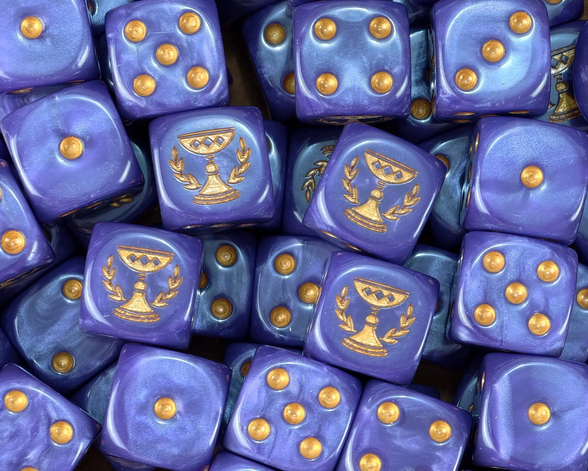 A pile of purple Soul Drinkers D6 with gold winged chalices