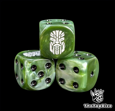 Close-up of a green D6 die with a white ancestor rune