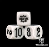Ivory white 16mm dice close up, four of them, black numerals with nothing to soften them