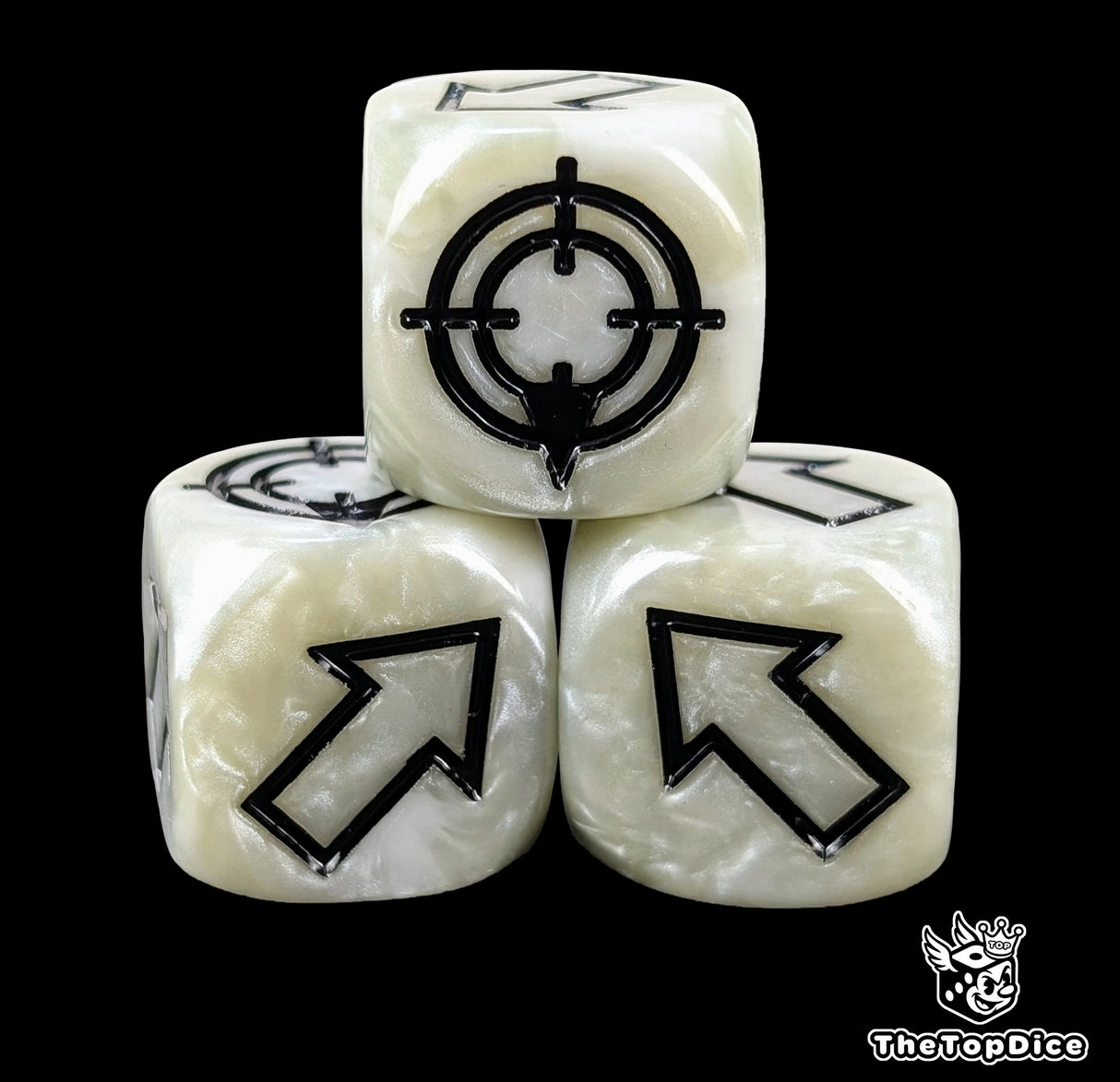 Close up of a white resin scatter die showing the black direction arrows