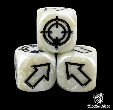 Close up of a white resin scatter die showing the black direction arrows