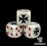 Close up of a white and grey 16mm resin D6 die engraved with a black cross and red pips