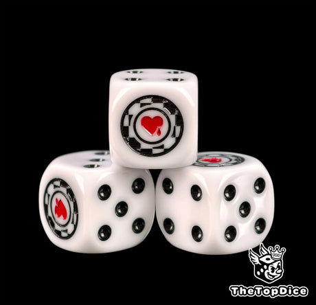 Three white Lamenters dice with black pips and a red heart on a chip