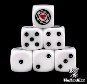 Six white Lamenters D6 stacked, black pips and a red heart poker chip