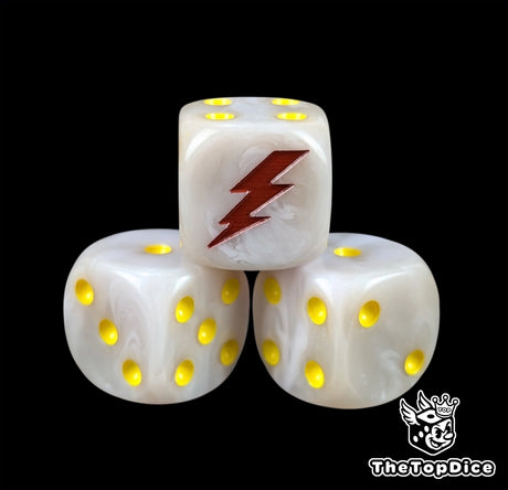 Close up of a white 16mm resin D6 die engraved with a red lightning bolt and yellow pips