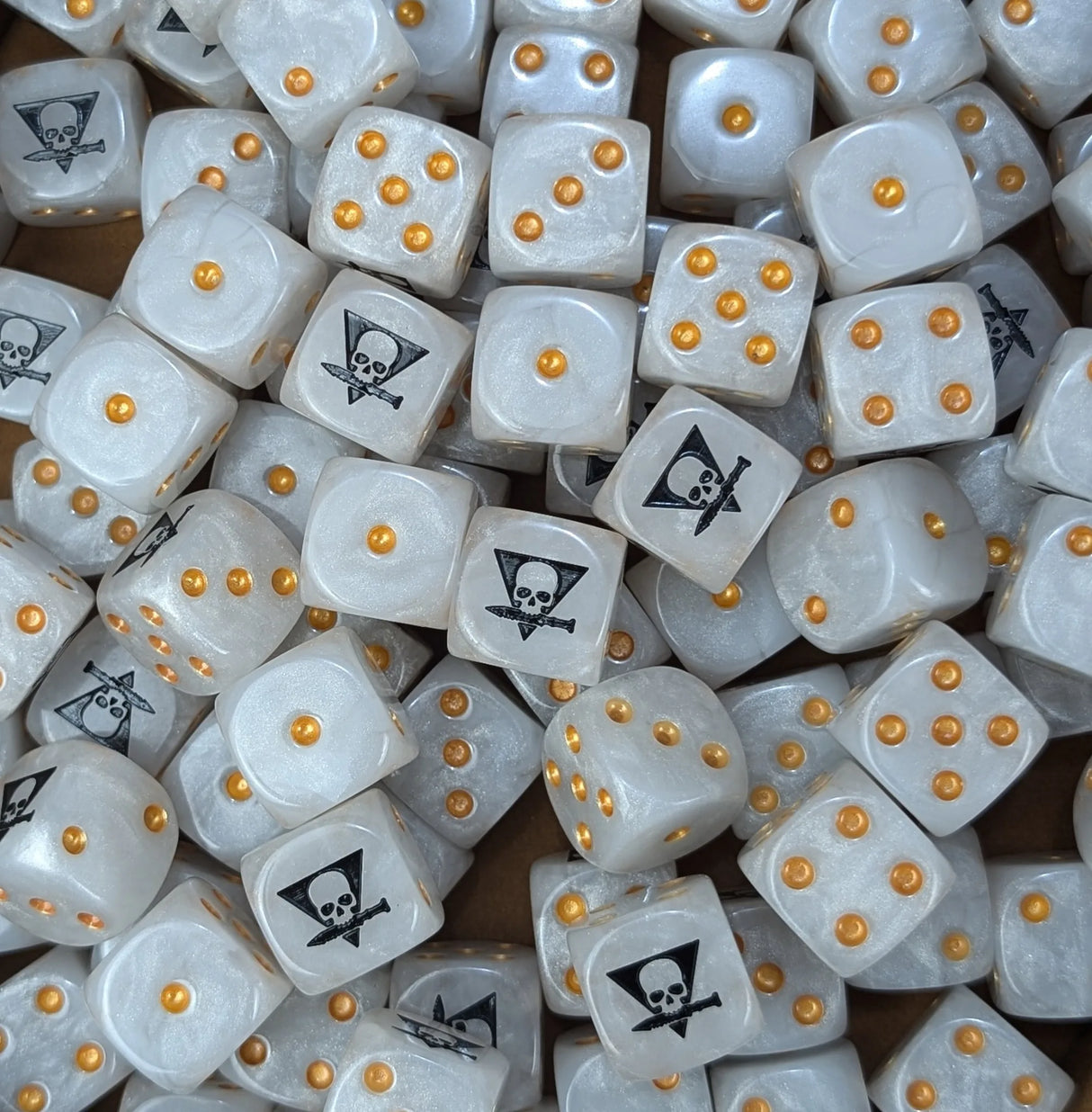 Pile of white skull squad 16mm D6 dice for a sci-fi skirmish team