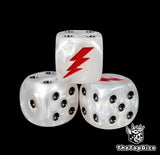 Close up of a white 16mm resin D6 die engraved with a red lightning bolt and black pips