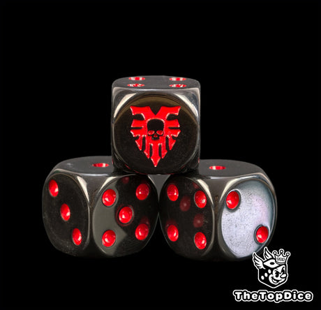 Close up of black World Eaters dice with red pips and a red Khorne skull rune