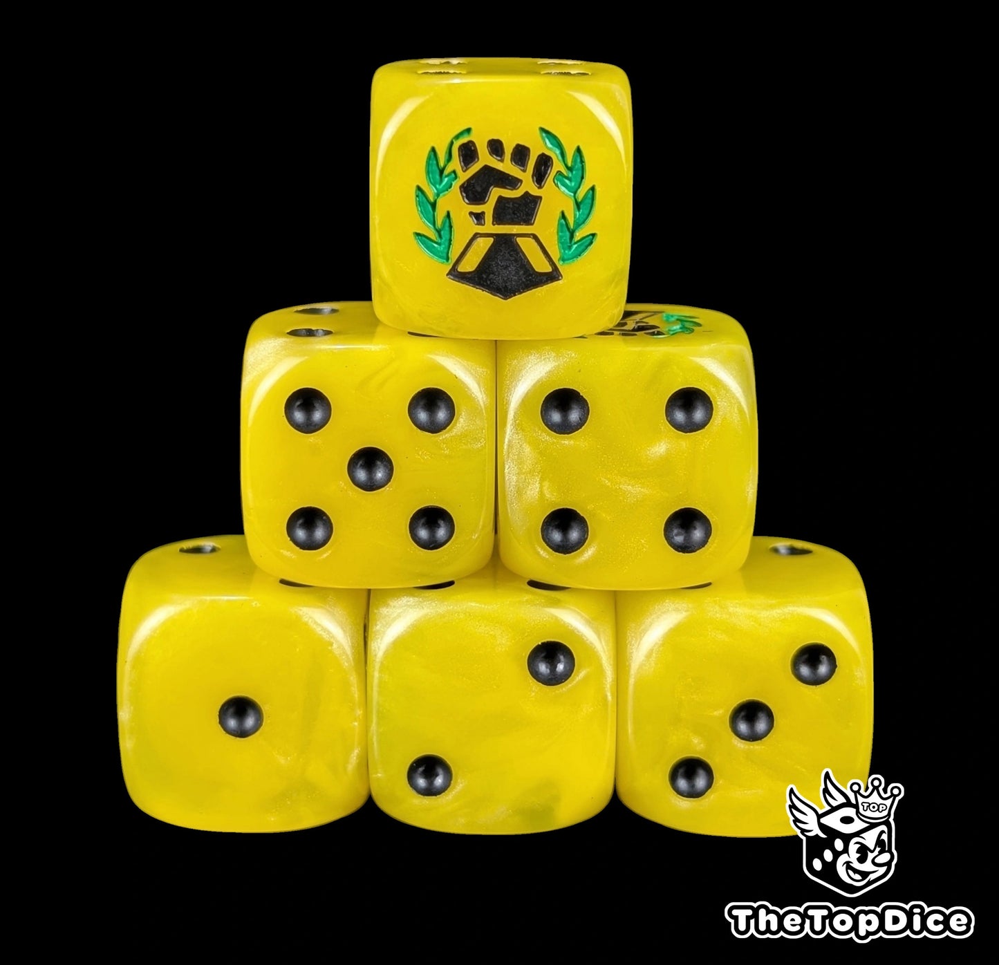 Yellow 16mm D6 dice with a black fist and green laurel emblem and black pips for sci-fi wargaming