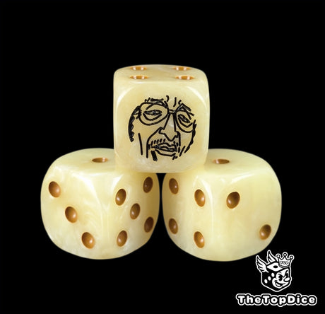 Close up of a yellow 16mm resin D6 die engraved with a black admiral emblem and mustard pips
